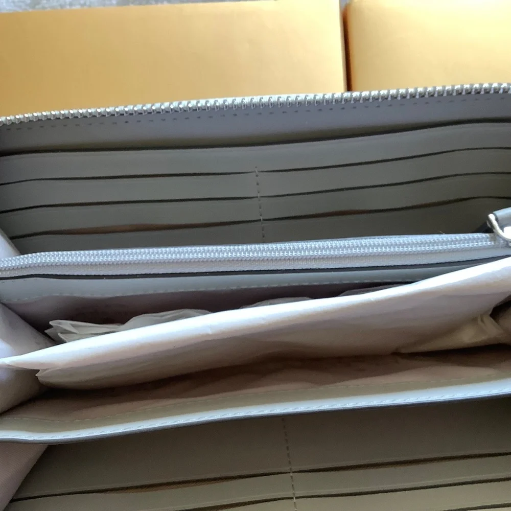 Kate Spade New York GLIMMER LARGE CONTINENTAL WALLET Silver